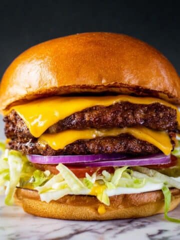Smash Burger Recipe with Cheddar, Pickles, and Fresh Toppings Recipe