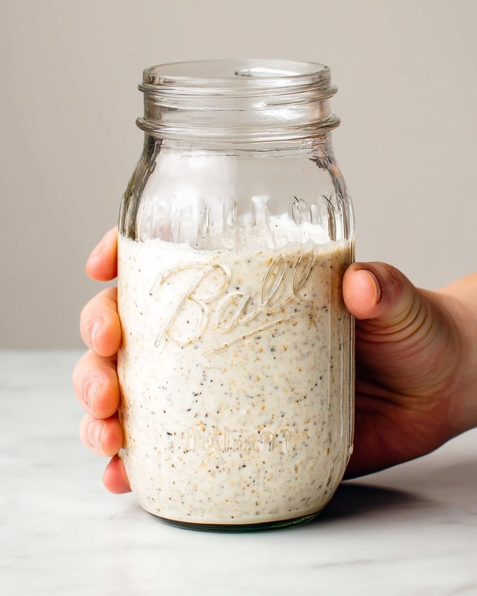 A clear glass jar with