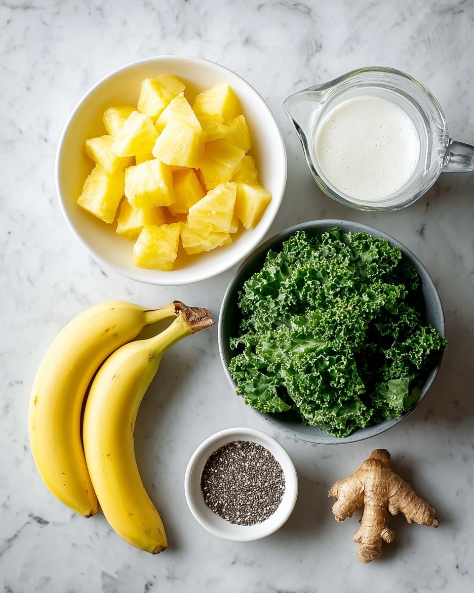 The image shows a top view of fresh ingredients arranged on a white marbled surface. There are two whole yellow bananas at the bottom left. Above them, there is a transparent glass measuring cup filled with white milk. In the center, a white bowl holds frozen bright yellow pineapple chunks with a frosty texture. To the right of the pineapple, a grey bowl is filled with fresh, curly green kale leaves. Below the kale, there is a small white cup filled with black and white chia seeds. Finally, a small piece of light brown fresh ginger root lies at the bottom right. photo taken with an iphone --ar 4:5 --v 7