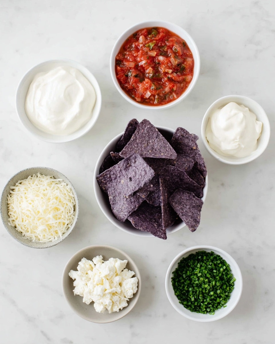 The image shows seven small white bowls arranged on a white marbled surface. Starting from the top left, there is a bowl filled with smooth, white sour cream. To its right, there is a bowl of chunky red salsa with visible pieces of tomato and green peppers. Below the salsa bowl, a larger white bowl is filled with deep purple blue corn tortilla chips with a rough texture. To the left of the chips, a bowl contains crumbly white cheese. Below the cheese, a gray bowl holds shredded white cheese with a soft texture. To the right of this bowl, a small white bowl is filled with small green chopped chives. Finally, to the right of the chips, there is another white bowl of smooth sour cream. The bowls and chips create a neat layout on the clean, white marbled surface. photo taken with an iphone --ar 4:5 --v 7