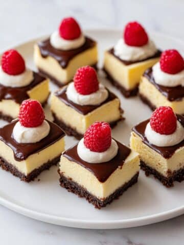 Cheesecake Bars with Chocolate Ganache, Salted Caramel, and Fresh Fruit Recipe