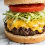 Smash Burgers with Onion, Cheese, and Homemade Sauce Recipe