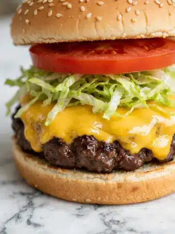 Smash Burgers with Onion, Cheese, and Homemade Sauce Recipe